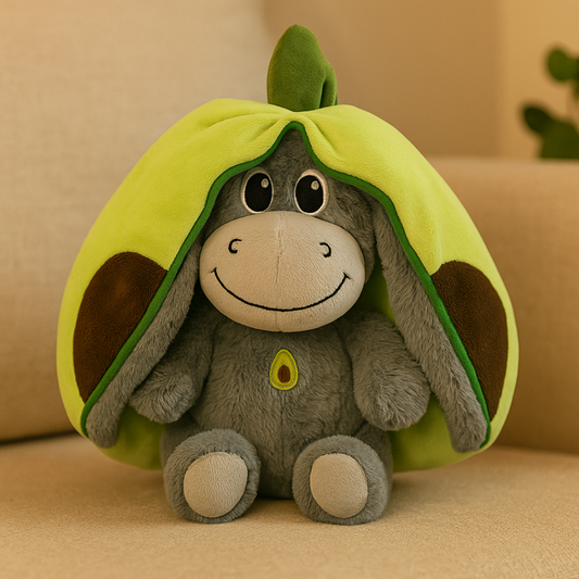 Plush toy donkey inside an avocado shell on a beige background