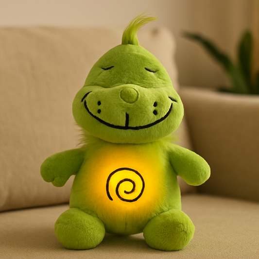 Green plush toy with a spiral light on a beige couch
